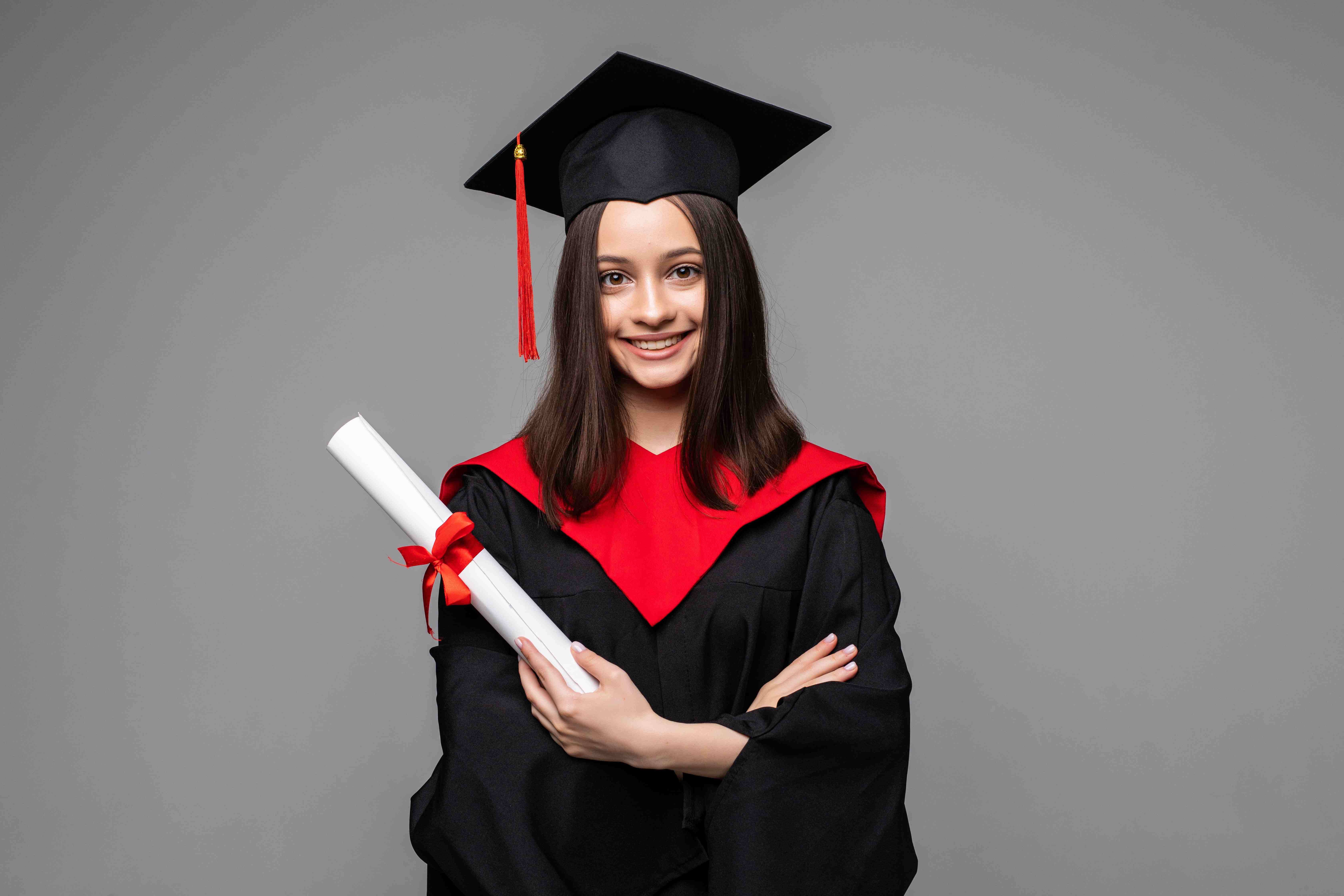 happy-student-with-graduation-hat-diploma-grey (1)_11zon